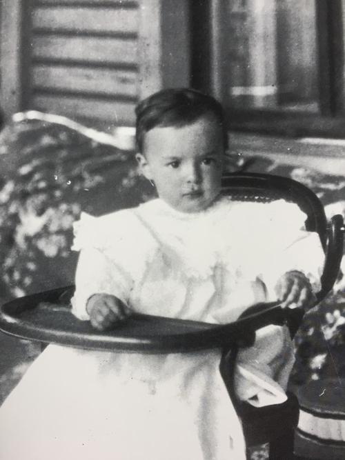 VN in 1901, two years old, on the veranda of the Vyra mansion. © The Vladimir Nabokov Literary Foundation.